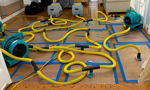 Professional Storm Water Damage Restoration technician working in Hampton, NH